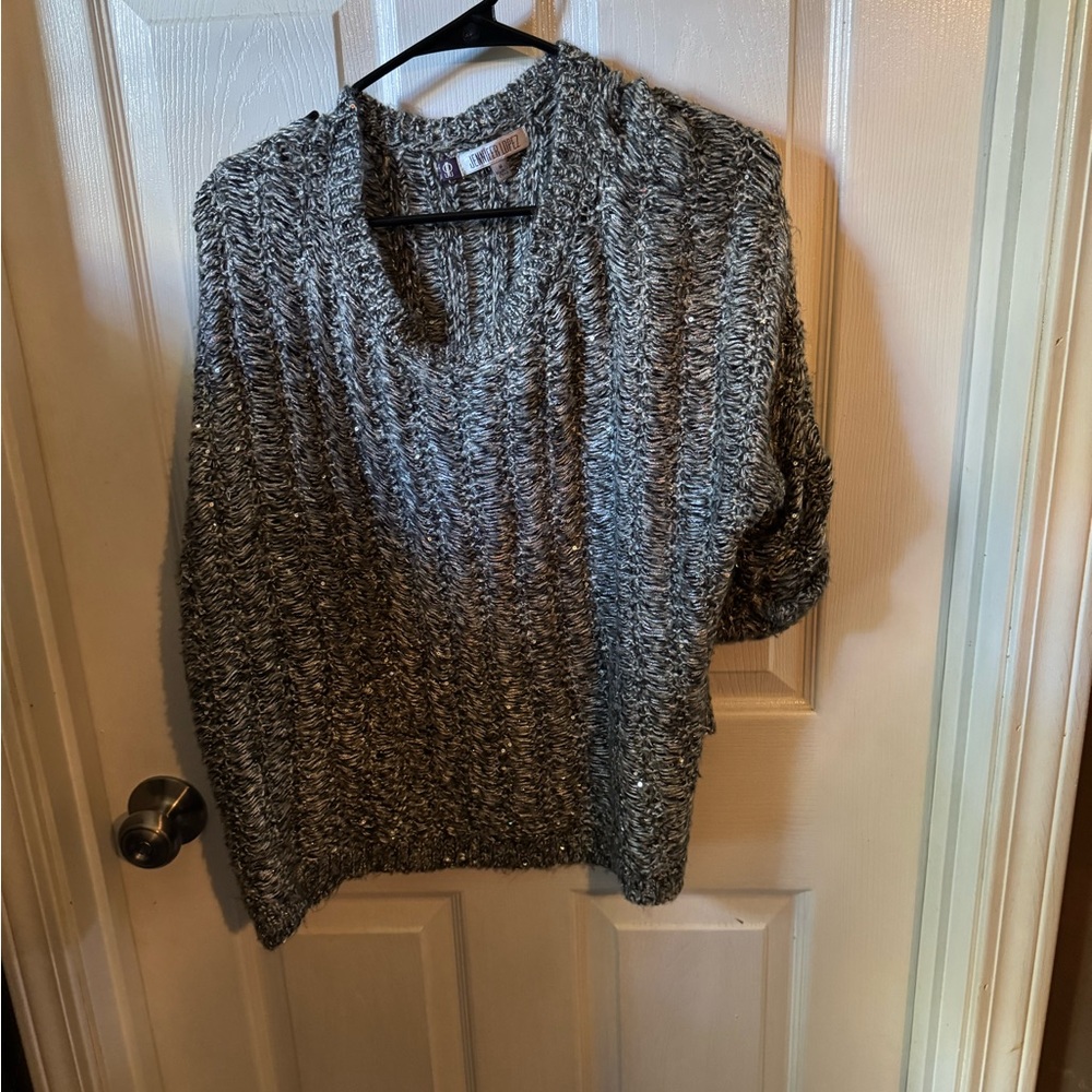 Jennifer Lopez Black and White V-Neck Sweater